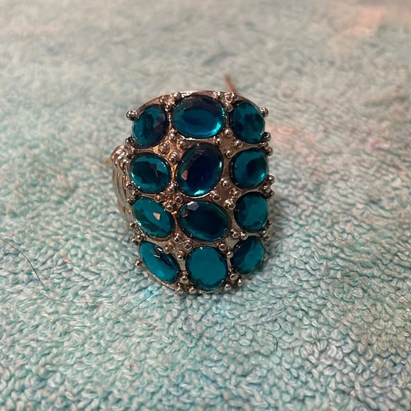 Vintage Jewelry - Adjustable, blue stones set in metal ring.